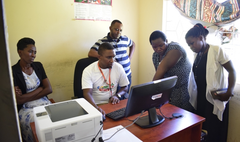 Officers undergoing computer training.